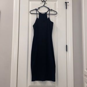 Skin tight black stress with spaghetti straps